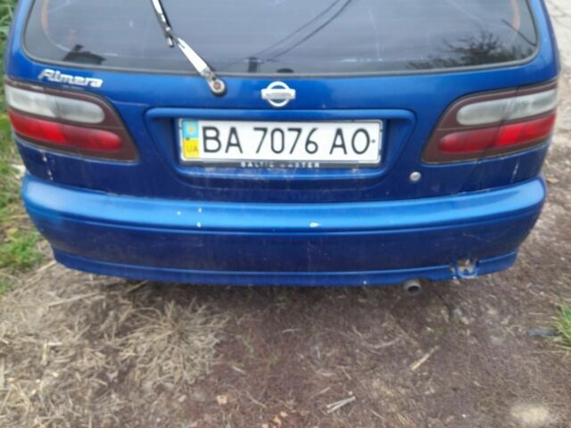 Синій Ніссан Альмера, об'ємом двигуна 1 л та пробігом 300 тис. км за 1350 $, фото 1 на Automoto.ua