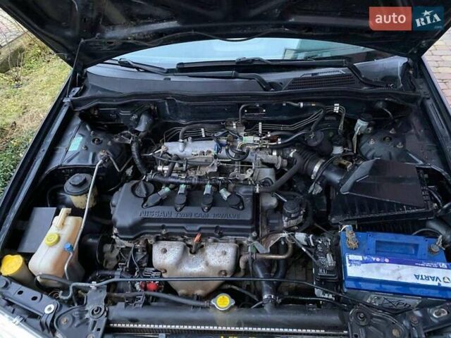 Синий Ниссан Альмера, объемом двигателя 1.5 л и пробегом 250 тыс. км за 1999 $, фото 3 на Automoto.ua