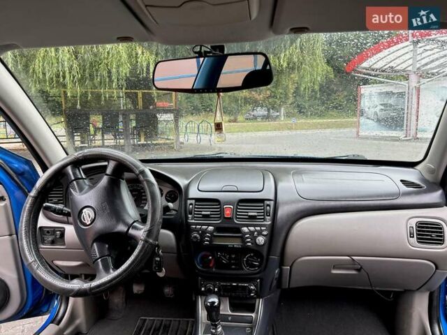 Синий Ниссан Альмера, объемом двигателя 2.2 л и пробегом 200 тыс. км за 3800 $, фото 4 на Automoto.ua