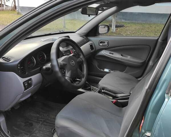 Синий Ниссан Альмера, объемом двигателя 1.5 л и пробегом 293 тыс. км за 3600 $, фото 3 на Automoto.ua