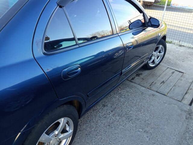 Синий Ниссан Альмера, объемом двигателя 1.6 л и пробегом 265 тыс. км за 4000 $, фото 3 на Automoto.ua