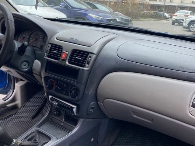 Синий Ниссан Альмера, объемом двигателя 1.5 л и пробегом 217 тыс. км за 2499 $, фото 11 на Automoto.ua