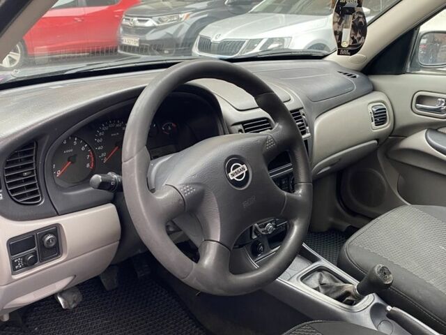 Синий Ниссан Альмера, объемом двигателя 1.5 л и пробегом 217 тыс. км за 2499 $, фото 7 на Automoto.ua