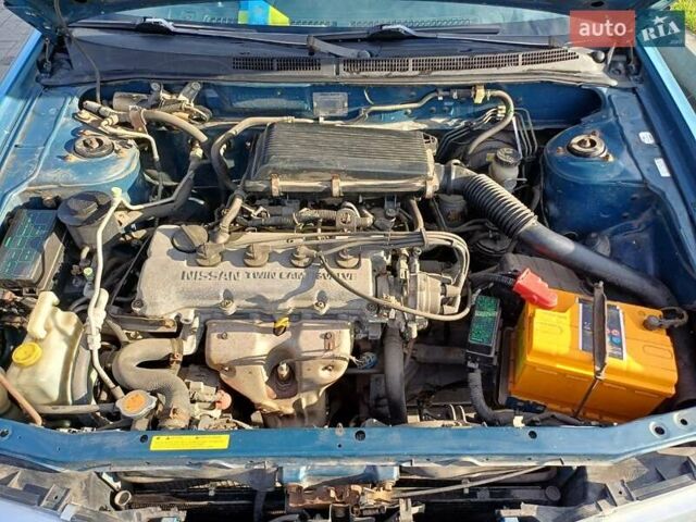 Синий Ниссан Альмера, объемом двигателя 1.6 л и пробегом 289 тыс. км за 2000 $, фото 7 на Automoto.ua