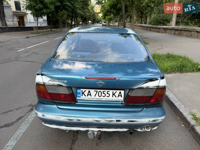 Синий Ниссан Альмера, объемом двигателя 1.4 л и пробегом 150 тыс. км за 2000 $, фото 3 на Automoto.ua