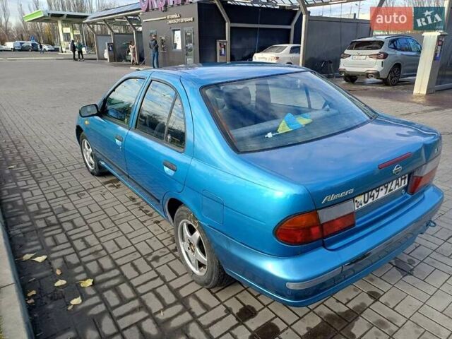 Синий Ниссан Альмера, объемом двигателя 1.6 л и пробегом 289 тыс. км за 2000 $, фото 3 на Automoto.ua