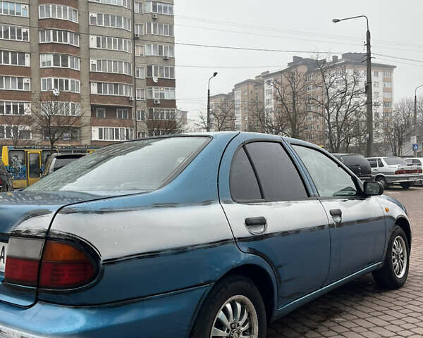 Синий Ниссан Альмера, объемом двигателя 1.4 л и пробегом 155 тыс. км за 1950 $, фото 6 на Automoto.ua