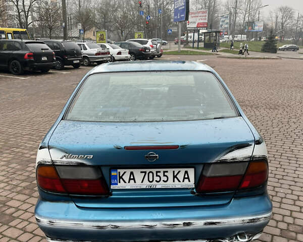 Синий Ниссан Альмера, объемом двигателя 1.4 л и пробегом 155 тыс. км за 1950 $, фото 7 на Automoto.ua