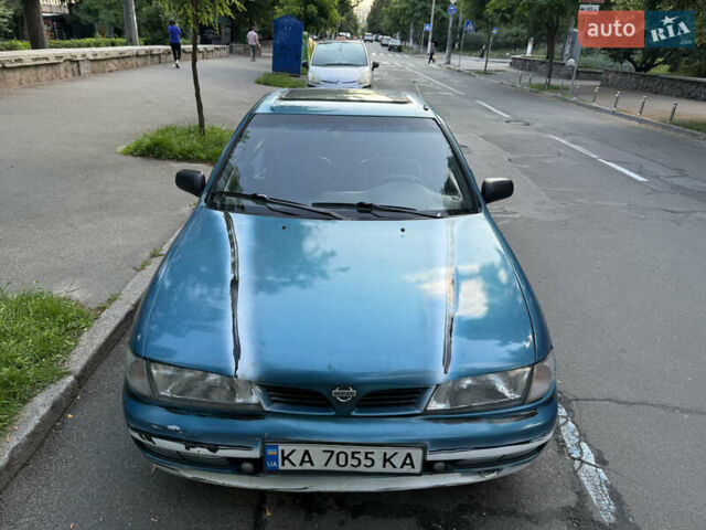 Синий Ниссан Альмера, объемом двигателя 1.4 л и пробегом 150 тыс. км за 2000 $, фото 2 на Automoto.ua