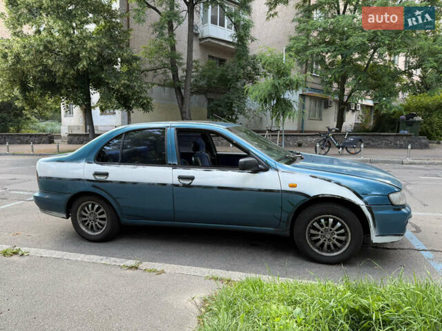 Синий Ниссан Альмера, объемом двигателя 1.4 л и пробегом 150 тыс. км за 2000 $, фото 7 на Automoto.ua