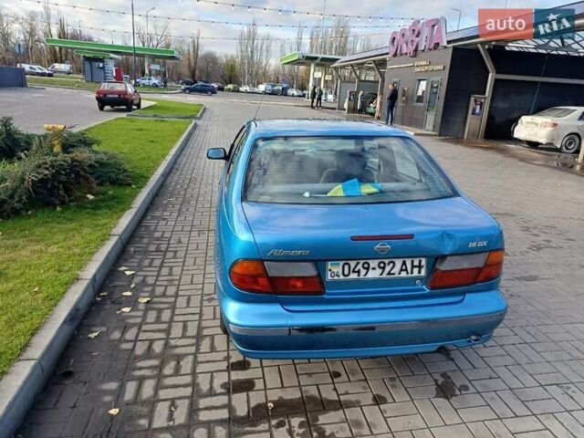 Синий Ниссан Альмера, объемом двигателя 1.6 л и пробегом 289 тыс. км за 2000 $, фото 4 на Automoto.ua