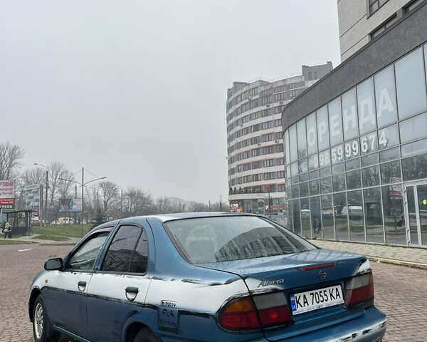 Синий Ниссан Альмера, объемом двигателя 1.4 л и пробегом 155 тыс. км за 1950 $, фото 8 на Automoto.ua