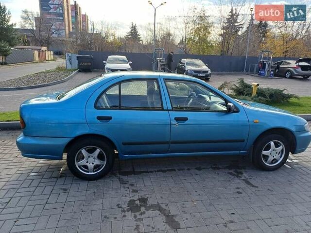 Синий Ниссан Альмера, объемом двигателя 1.6 л и пробегом 289 тыс. км за 2000 $, фото 2 на Automoto.ua