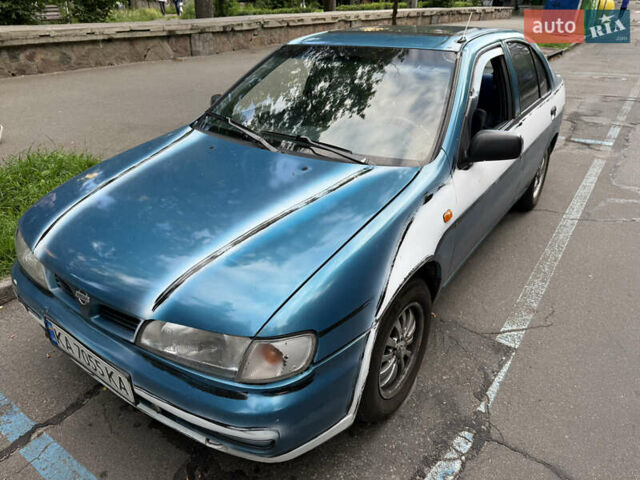 Синий Ниссан Альмера, объемом двигателя 1.4 л и пробегом 150 тыс. км за 2000 $, фото 4 на Automoto.ua