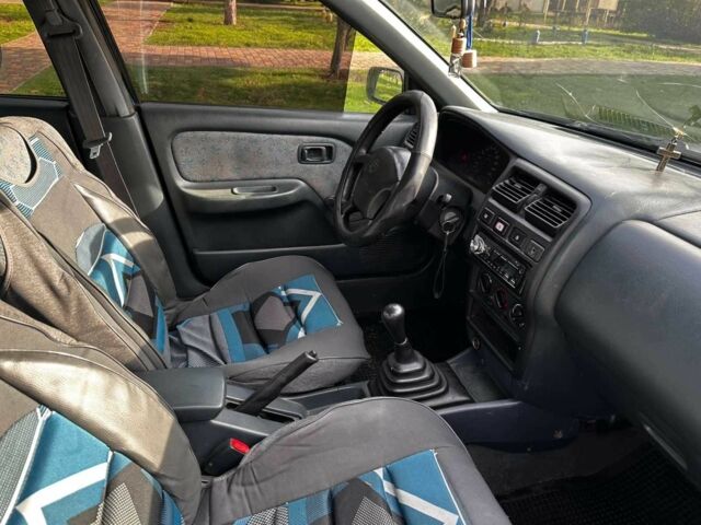 Синій Ніссан Альмера, об'ємом двигуна 1.4 л та пробігом 200 тис. км за 1700 $, фото 10 на Automoto.ua