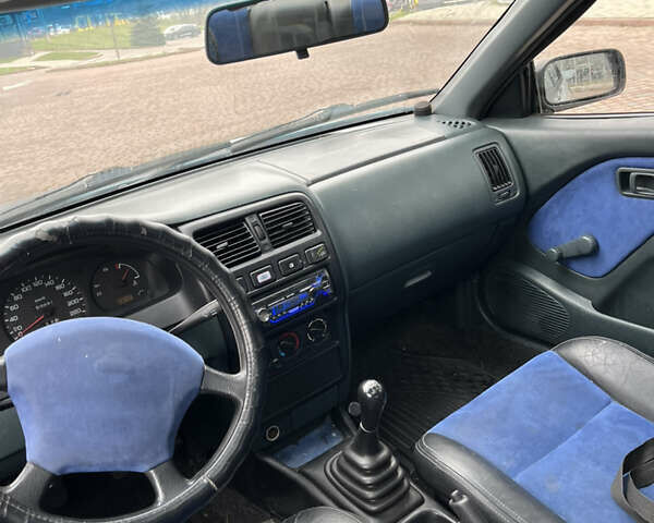 Синий Ниссан Альмера, объемом двигателя 1.4 л и пробегом 155 тыс. км за 1950 $, фото 12 на Automoto.ua