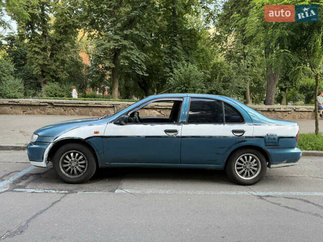 Синий Ниссан Альмера, объемом двигателя 1.4 л и пробегом 150 тыс. км за 2000 $, фото 6 на Automoto.ua