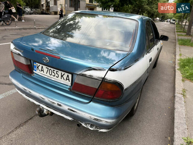 Синий Ниссан Альмера, объемом двигателя 1.4 л и пробегом 150 тыс. км за 2000 $, фото 5 на Automoto.ua