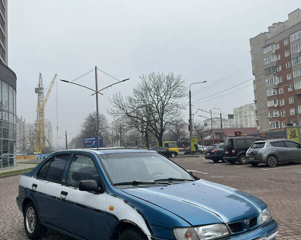 Синий Ниссан Альмера, объемом двигателя 1.4 л и пробегом 155 тыс. км за 1950 $, фото 3 на Automoto.ua