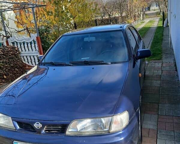 Синій Ніссан Альмера, об'ємом двигуна 1.4 л та пробігом 295 тис. км за 2650 $, фото 9 на Automoto.ua