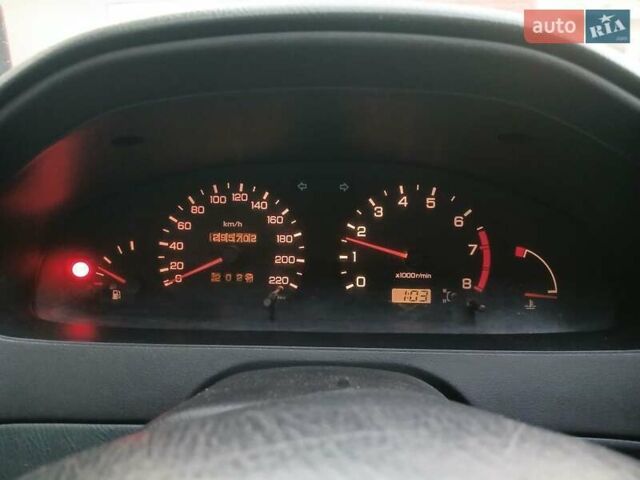 Синій Ніссан Альмера, об'ємом двигуна 1.4 л та пробігом 295 тис. км за 2650 $, фото 10 на Automoto.ua