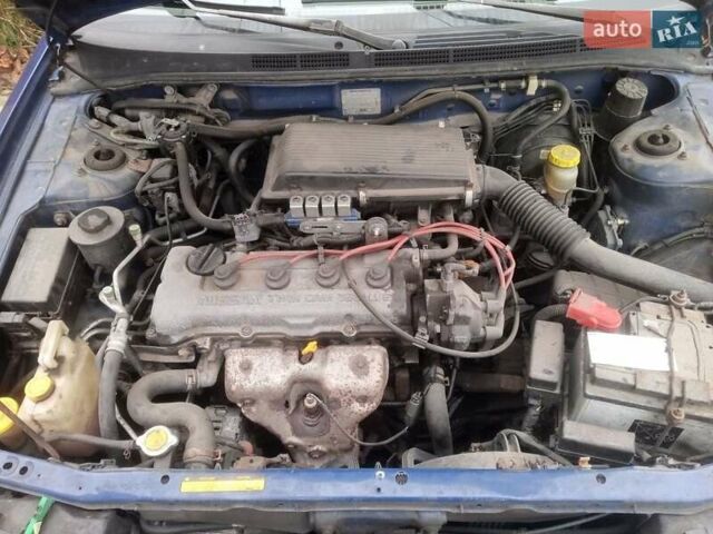 Синій Ніссан Альмера, об'ємом двигуна 1.4 л та пробігом 323 тис. км за 1800 $, фото 9 на Automoto.ua