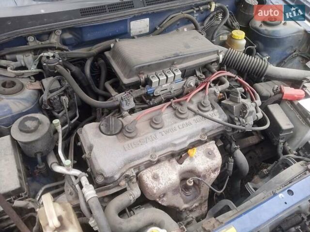 Синій Ніссан Альмера, об'ємом двигуна 1.4 л та пробігом 323 тис. км за 1800 $, фото 10 на Automoto.ua