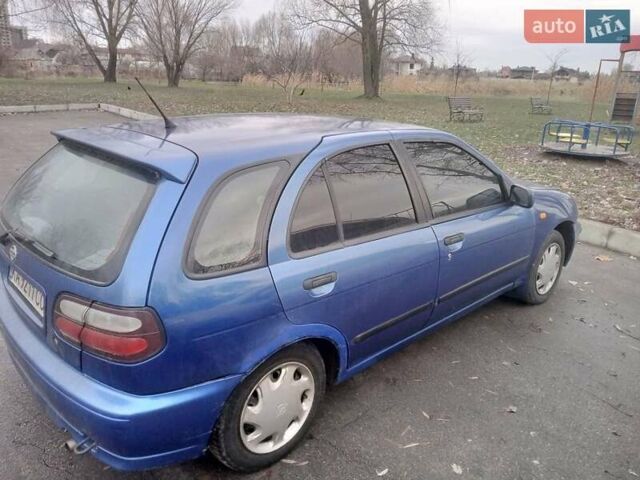 Синій Ніссан Альмера, об'ємом двигуна 1.4 л та пробігом 323 тис. км за 1800 $, фото 4 на Automoto.ua