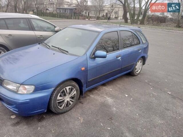 Синій Ніссан Альмера, об'ємом двигуна 1.4 л та пробігом 323 тис. км за 1800 $, фото 1 на Automoto.ua