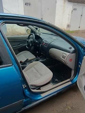 Синій Ніссан Альмера, об'ємом двигуна 1.5 л та пробігом 300 тис. км за 2900 $, фото 10 на Automoto.ua