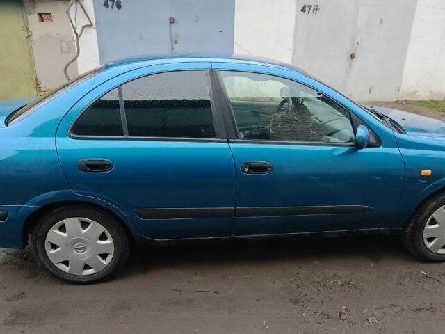 Синій Ніссан Альмера, об'ємом двигуна 1.5 л та пробігом 300 тис. км за 2899 $, фото 14 на Automoto.ua
