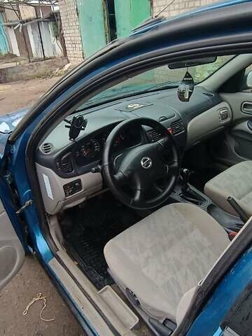 Синій Ніссан Альмера, об'ємом двигуна 1.5 л та пробігом 300 тис. км за 2900 $, фото 8 на Automoto.ua