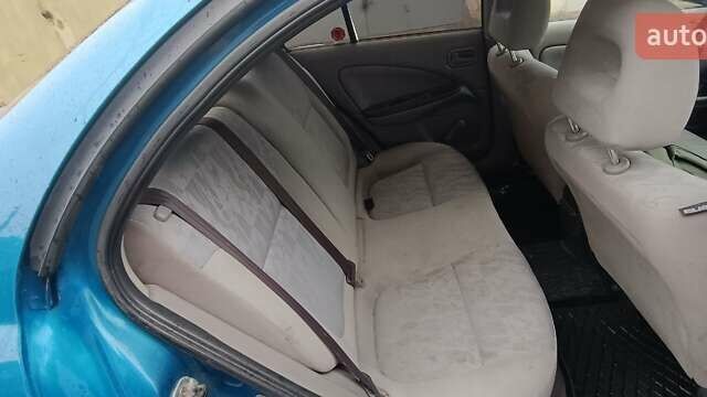 Синій Ніссан Альмера, об'ємом двигуна 1.5 л та пробігом 300 тис. км за 2900 $, фото 3 на Automoto.ua