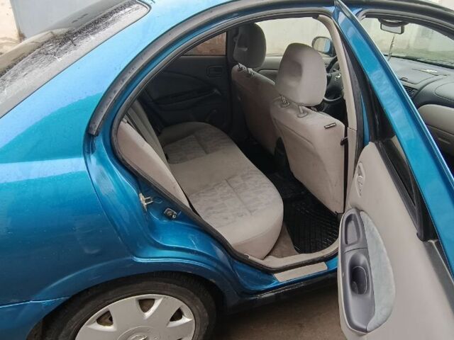 Синій Ніссан Альмера, об'ємом двигуна 1.5 л та пробігом 300 тис. км за 2899 $, фото 8 на Automoto.ua