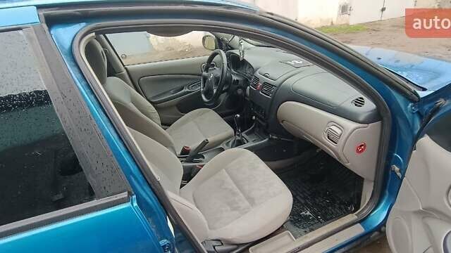 Синій Ніссан Альмера, об'ємом двигуна 1.5 л та пробігом 300 тис. км за 2900 $, фото 16 на Automoto.ua