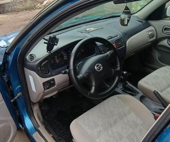 Синій Ніссан Альмера, об'ємом двигуна 1.5 л та пробігом 300 тис. км за 2899 $, фото 9 на Automoto.ua