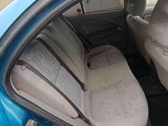 Синій Ніссан Альмера, об'ємом двигуна 1.5 л та пробігом 300 тис. км за 2899 $, фото 12 на Automoto.ua