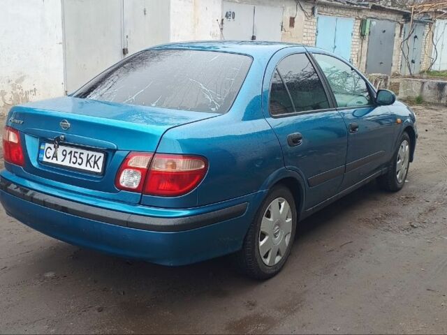 Синій Ніссан Альмера, об'ємом двигуна 1.5 л та пробігом 300 тис. км за 2899 $, фото 4 на Automoto.ua