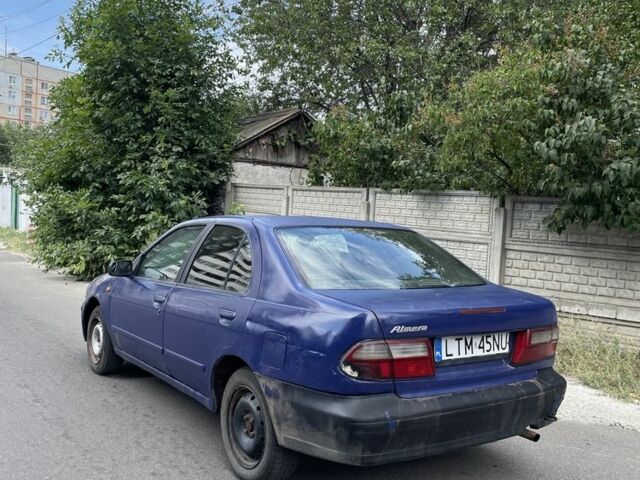 Синий Ниссан Альмера, объемом двигателя 2 л и пробегом 333 тыс. км за 800 $, фото 2 на Automoto.ua