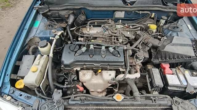 Синій Ніссан Альмера, об'ємом двигуна 1.5 л та пробігом 300 тис. км за 2900 $, фото 12 на Automoto.ua
