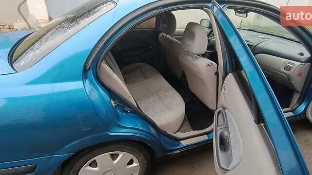 Синій Ніссан Альмера, об'ємом двигуна 1.5 л та пробігом 300 тис. км за 2900 $, фото 11 на Automoto.ua