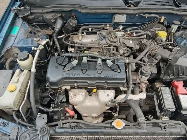 Синій Ніссан Альмера, об'ємом двигуна 1.5 л та пробігом 300 тис. км за 2899 $, фото 3 на Automoto.ua