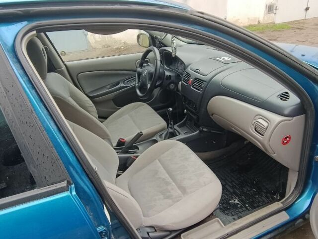 Синій Ніссан Альмера, об'ємом двигуна 1.5 л та пробігом 300 тис. км за 2899 $, фото 6 на Automoto.ua