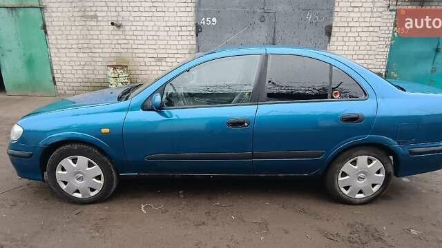 Синій Ніссан Альмера, об'ємом двигуна 1.5 л та пробігом 300 тис. км за 2900 $, фото 4 на Automoto.ua