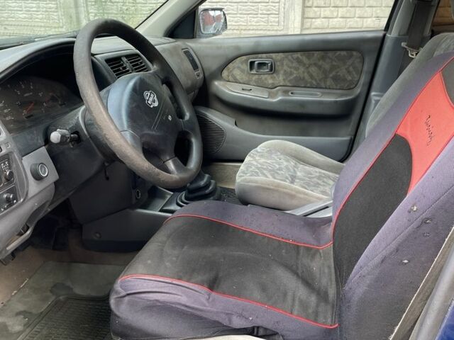 Синий Ниссан Альмера, объемом двигателя 2 л и пробегом 333 тыс. км за 800 $, фото 3 на Automoto.ua