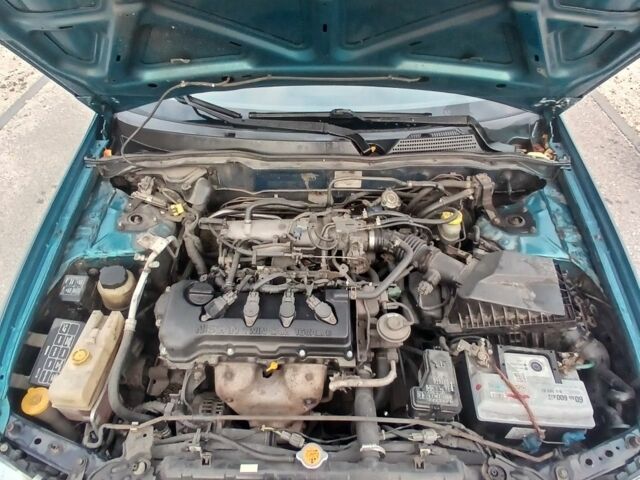 Синий Ниссан Альмера, объемом двигателя 1.6 л и пробегом 241 тыс. км за 3000 $, фото 7 на Automoto.ua