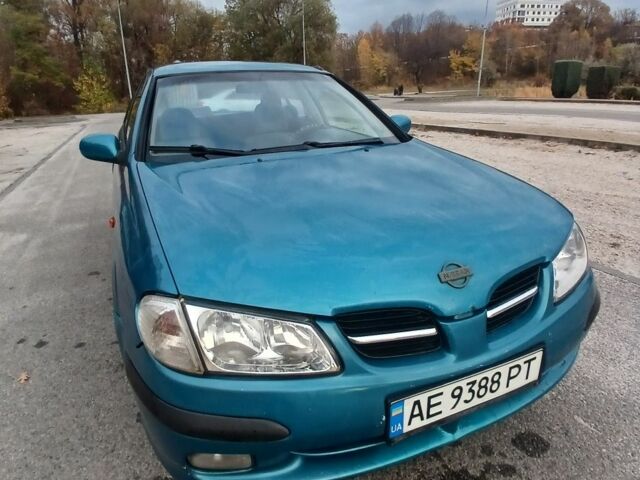 Синий Ниссан Альмера, объемом двигателя 1.6 л и пробегом 241 тыс. км за 3000 $, фото 1 на Automoto.ua