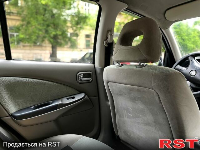 Синий Ниссан Альмера, объемом двигателя 1.5 л и пробегом 251 тыс. км за 3100 $, фото 11 на Automoto.ua