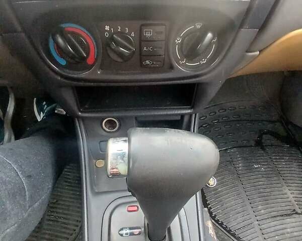 Синій Ніссан Альмера, об'ємом двигуна 1.6 л та пробігом 241 тис. км за 3000 $, фото 12 на Automoto.ua