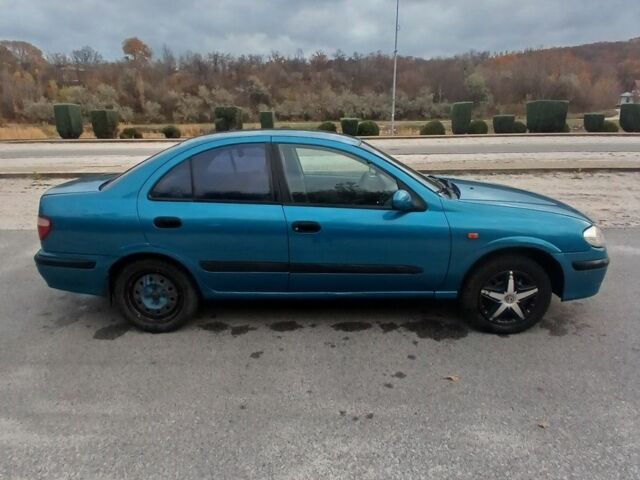 Синий Ниссан Альмера, объемом двигателя 1.6 л и пробегом 241 тыс. км за 3000 $, фото 3 на Automoto.ua